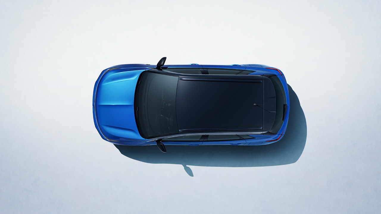 Birds-eye view of a blue Opel Grandland Plug-in-Hybrid with black roof